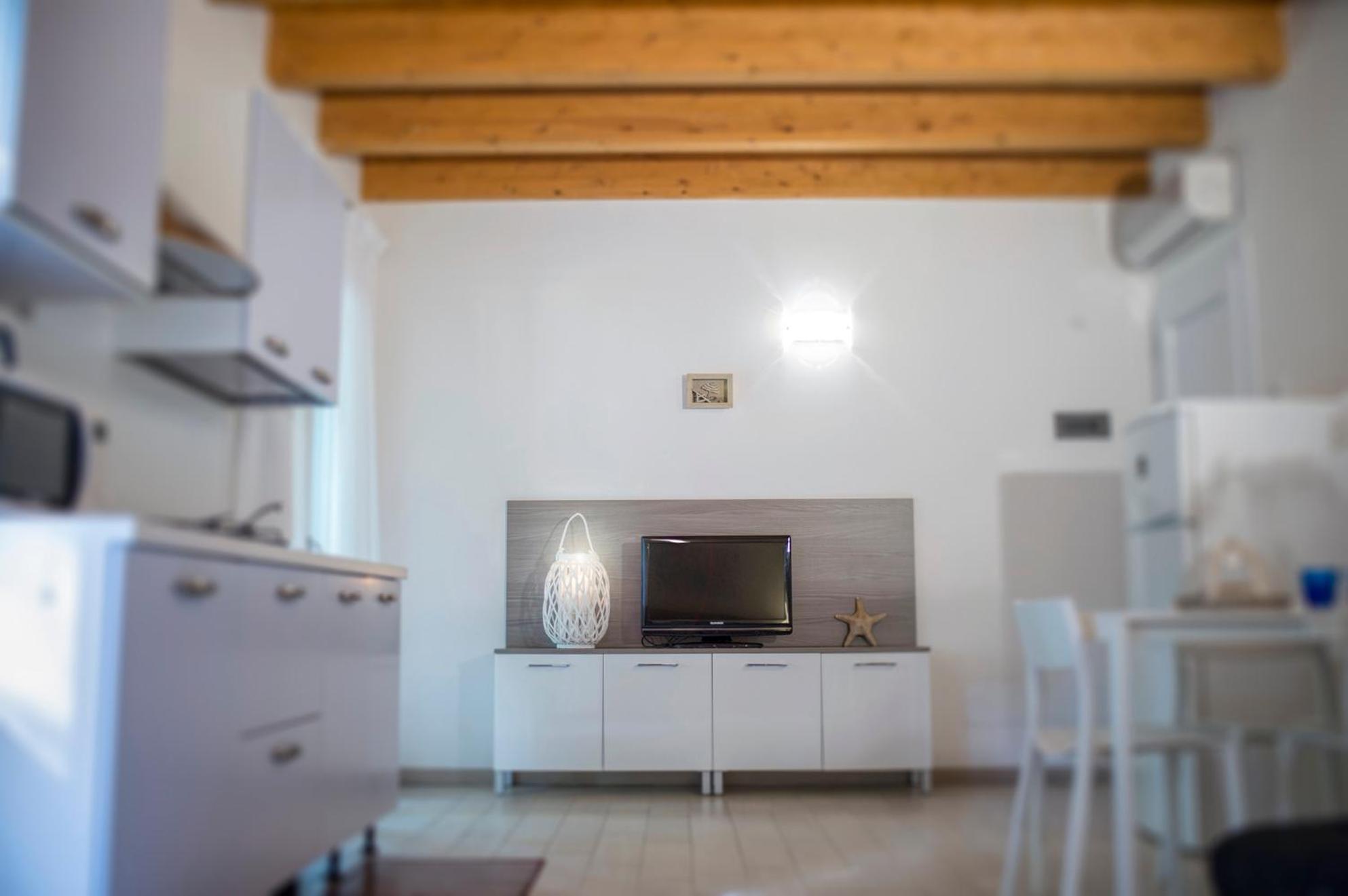Residence Duna Rossa - Family Friendly Duna Verde Quarto foto